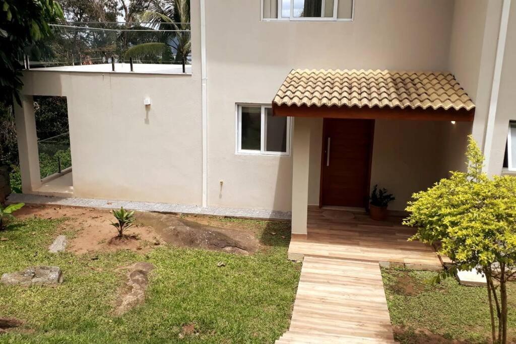 Casa com varanda e ar condicionado perto do centro Ilhabela Exterior foto